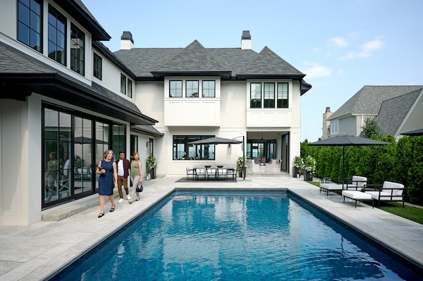 photograph of a house with a pool